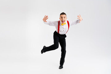Full body portrait of funny elegant young man retro dance isolated on white color background