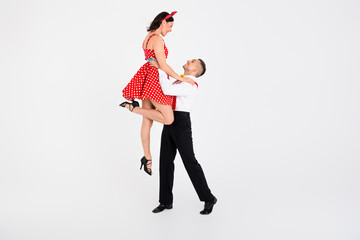 Photo of attractive couple professional dancers choreographers learning waltz dance isolated on white color background