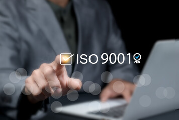 ISO 9001 Standard certification standardization quality control concept, businessman choose ISO 9001 icons for certified and quality management of organizations.