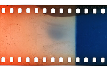 Dusty and grungy 35mm film texture or surface. Perforated scratched camera film isolated on white background.