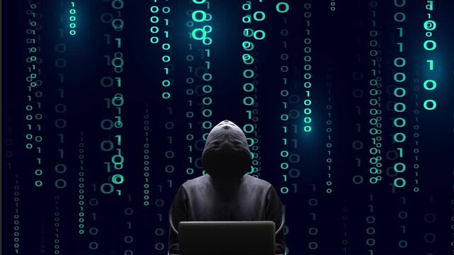 Silhouette noire centr&eacute;e du cybercriminel devant son &eacute;cran d'ordinateur portable sur fond de donn&eacute;es binaires anim&eacute;es couleur cyan