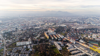 Austria, Vienna: Top Aerial View of Quiet Residential Areas in Districts 21 and 22. A peaceful perspective showcasing the serene neighborhoods of the Austrian capital