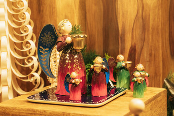 Charming handmade angel figurines crafted in vibrant colors, perfect for enhancing festive home decoration displays