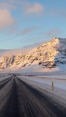 sunset over snowy mountains