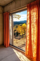 Detalle del ventanal en una villa con vistas a un paisaje otoñal iluminado por el sol