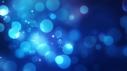 Abstract blue bokeh background with glowing circles and sparkles.