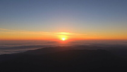 Fototapeta premium sunset over the mountains