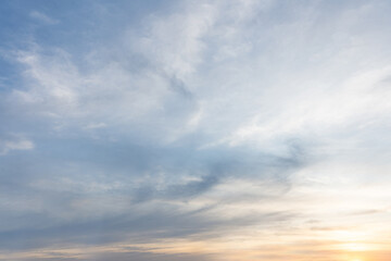 Obraz premium Serene Sunset Sky Soft Clouds Pastel Colors Nature Background