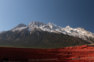 Lijiang, China, watch the Lijiang performance and climb the jade dragon mountain © Surapus