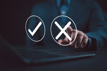 True False logic. Businessman think and choose choices between right and wrong symbols. Yes or No...