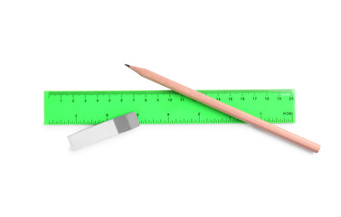 Ruler, pencil and eraser isolated on white, top view