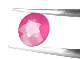 Tweezers with shiny pink gemstone isolated on white