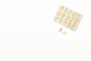 Blister of gelatin capsules on a white background