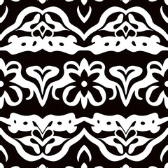 Monochromatic Floral Textile: Elegant black and white seamless pattern with stylized floral motifs. Perfect for fashion, home decor, and surface design.  