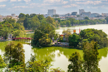 Fototapeta premium View of red bridge or The Huc Bridge in Hoan Kiem Lake, Hanoi City, Vietnam