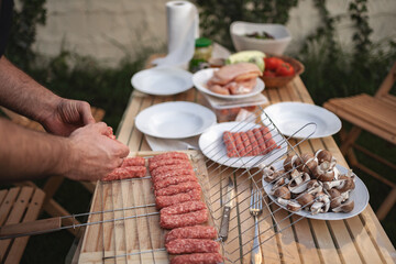 Preparing a flavorful barbecue feast in a vibrant backyard setting