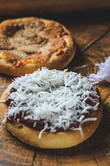 Banana esfiha or mini pizza with cinnamon and grated coconut