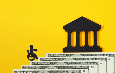 Disability person, money and courthouse. Legal rights and financial support.