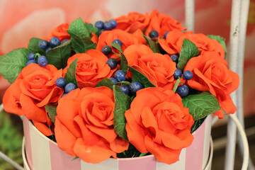 Original flowers made of polymer clay. The most realistic display. Soft focus. Close-up.