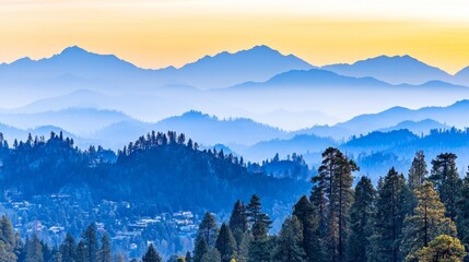 Obraz premium Serene Blue Mountain Range at Sunset Overlooking Town