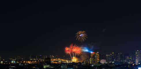 The blurred background of fireworks (light trails) is beautiful at night, seen in the New Year holidays, Christmas events, for tourists to take pictures during public travel.