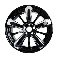 Obraz premium A sleek black alloy wheel with a polished finish, designed for automotive use. isolated on white background