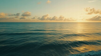 Obraz premium serene sunset over calm ocean waves