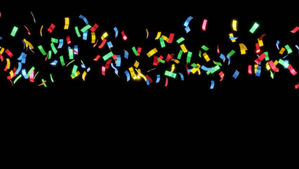 colourful confetti background for celebrations birthday party surprise concept, isolated on black.