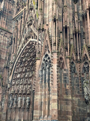 The Strasbourg Cathedral, a stunning example of Gothic architecture, featuring intricate details, a towering spire, and historical significance in Strasbourg, France