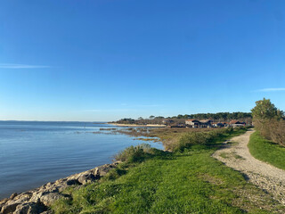 Beach of the Arcachon Bay, with scenic views of the coastline