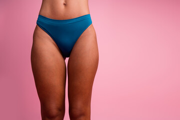 Cropped photo of lady wearing blue lingerie panties near copyspace isolated pastel color background