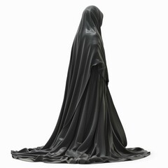 Naklejka premium Studio shot of a woman wearing a long black dress and headscarf, standing against a white background