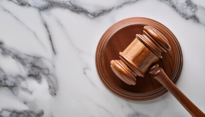 Wooden gavel on marble surface. Judge's hammer. Law and justice concept, constitution, courtroom.