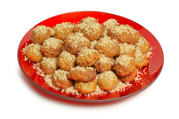 melomakarona on plate, greek xmas dessert with walnuts and honey syrup