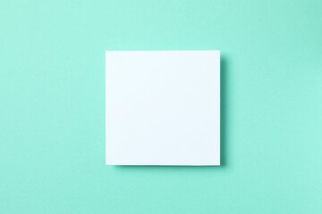 Paper card on color background. Empty greeting card for text design