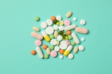 Various pills on a colored background