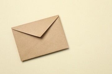 Paper envelope on color background