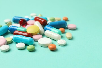 Various pills on a colored background