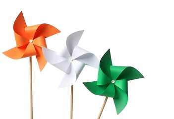 ndian tricolor paper pinwheels isolated on blue background. Conceptual image for Indian national day celebration and events. space for text