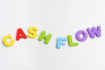 cash flow word in random flowing shape concept alphabet colorful text  on white background