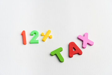 12% tax income government tax concept alphabet colorful text on white background