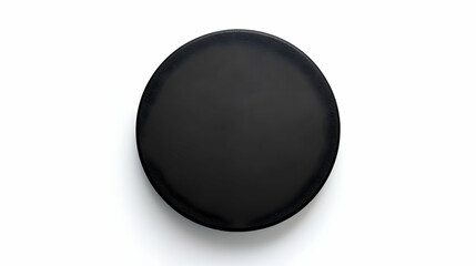 A simple black circular object on a white background.