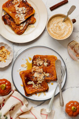 Pumpkin French Toast with Maple Syrup, Almonds and Powdered Sugar
