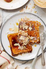 Pumpkin French Toast with Maple Syrup, Almonds and Powdered Sugar