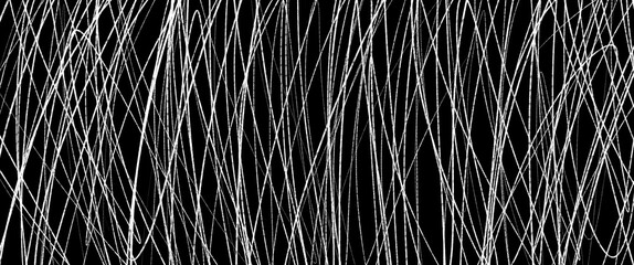 C white scribbled lines on a black background