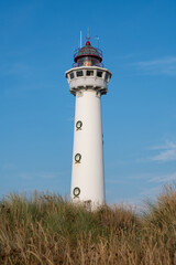 Lighthouse in the dunes of the Dutch town of Egmond aan Zee