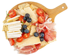 Charcuterie board. Wooden cutting board. Fruit and cheese platter. Cherry tomatoes and blueberries....