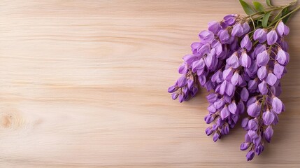 Fototapeta premium A bunch of purple flowers on a wooden surface