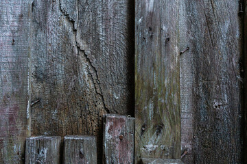Detail of an old wall made with pieces of wood