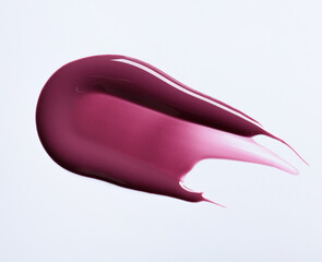 A burgundy maroon shade of lipgloss, lipstick smear, cosmetics beauty product texture, liquid...